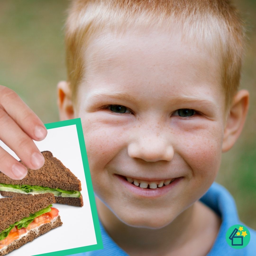 Happy little boy holding a ch word flashcard by Resourceible.
