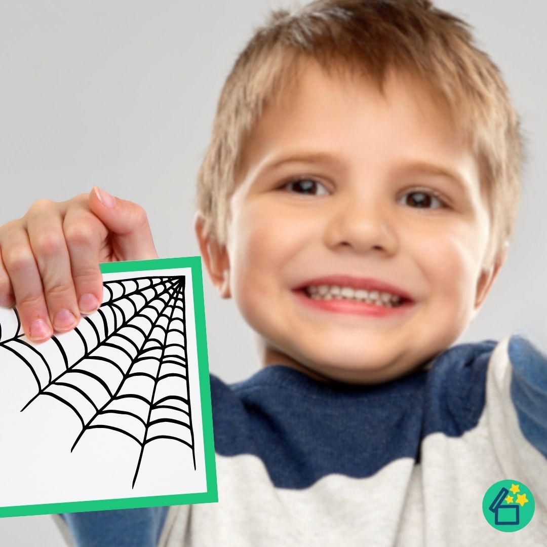 Little boy holding a flashcard ending in the B speech sound by Resourceible.